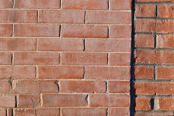 Red brick wall.