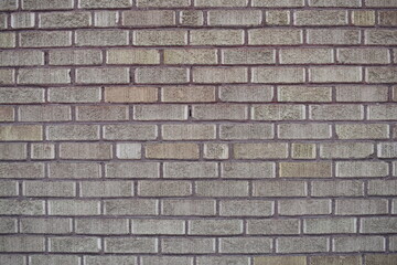 Gray colored brick wall.