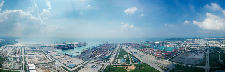 Aerial view of business logistic import-export transport sea freight transportation. Network logistics partnership connection busiest container ports. Container ships loading and unloading background.