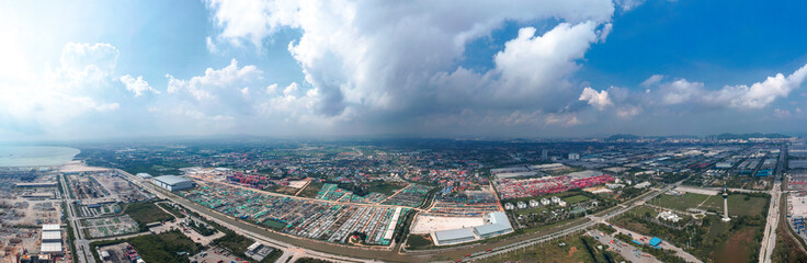 Aerial view of business logistic import-export transport sea freight transportation. Network logistics partnership connection busiest container ports. Container ships loading and unloading background.