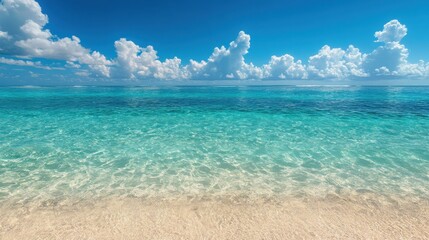 Obraz premium Tranquil Beach Scene Turquoise Water, White Sand, and Blue Sky