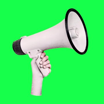 Hand holding loud megaphone transparent 4K video, green screen
