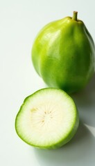 Taro sliced on white background with natural light exposure, showcasing its vibrant green color and texture, fruit, sliced