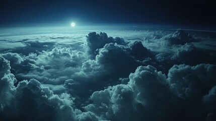 Above the clouds at night, moonlit sky