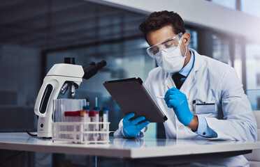 Clinic, scientist and man with tablet, medical research and data collection for test results and PPE. Healthcare, person and investigation for cure of cancer, immunotheraphy and treatment in lab
