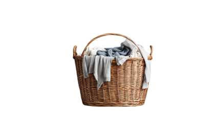 wicker basket for laundry full of clothes isolated on white