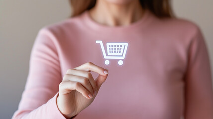 woman holding credit card and shopping cart
