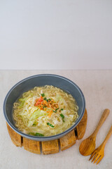 Flavorful Egg Noodle Soup Served Hot With Fresh Vegetables, Shredded Chicken, Fluffy Egg, Garnished With Crispy Shallots.