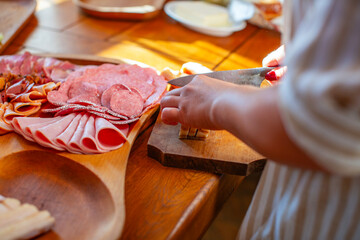 Person Preparing a Charcuterie Board