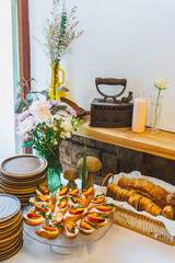 Rustic Table with Assorted Bread and Bruschetta