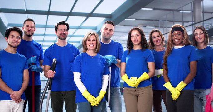 Multiracial Cleaning Team Providing Professional Office Janitorial Services