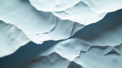 Obraz premium Torn paper soaked in water and then dried, creating a unique, warped, and organic texture.