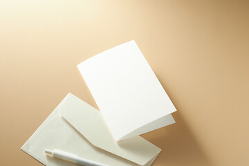 Blank Greeting Card With Envelope Resting on a Smooth Surface, Ready for Personalization at Any Time