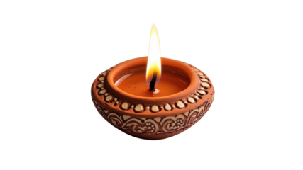 Decorative clay diya with a vibrant flame burning