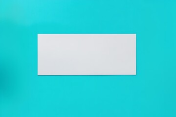 Fototapeta premium Blank white card on blue background