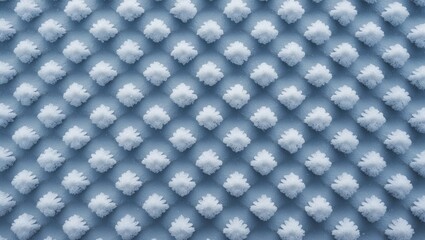 Blue textile surface with raised fluffy patterns in a repeated grid arrangement. Soft fabric texture background design.