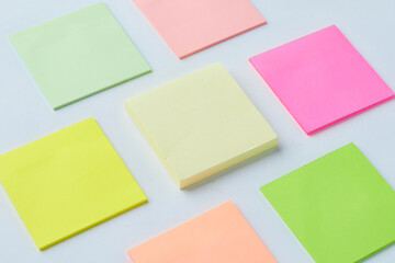 Colorful Sticky Notes Arranged in a Creative Pattern on a Light Surface