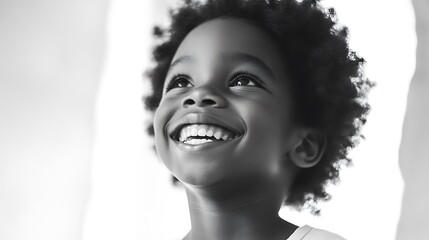 Happy Little Boy Smiling and Looking Upward in Black and White