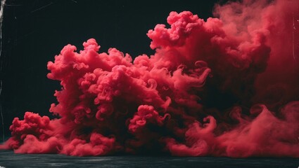 Fototapeta premium Red smoke explosion on a black background creating dramatic atmosphere with swirling patterns and textures in the air