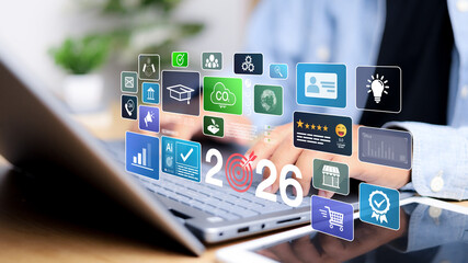 Businessman plan strategy marketing and finance to goal in 2026 planning business growth with technology AI and environmental care to New Year resolutions business.