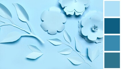 Paper flowers and leaves on light blue background. Different color patterns