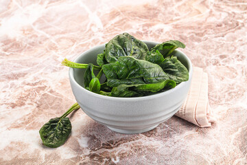 Fresh green spinach leaves heap