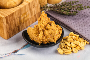 Crunchy peanut butter fat product