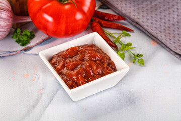 Salsa dip with chili and tomato
