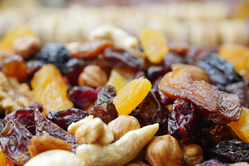 Dried fruits and nuts arranged in a colorful display for snacking