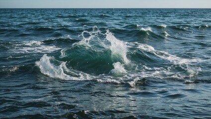 Fototapeta premium Ocean waves creating splash on the surface with ripples and sunlight reflecting on the water Copy Space