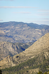 The mountain panorama opening from the hiking path to Puig Ca Campana, Finestrat, Spain  