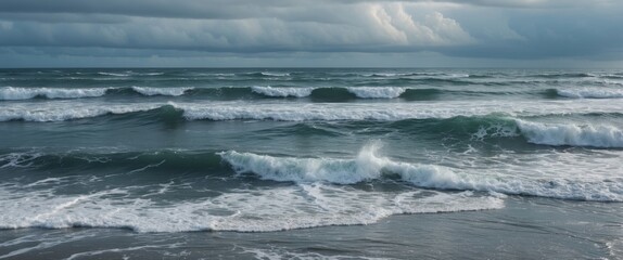 Fototapeta premium Ocean waves crashing on the shore under a cloudy sky with varying shades of blue and green Copy Space