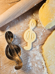 Dough, Music Note Cookie Cutter, baking cookies in the shape of a musical note. High quality photo