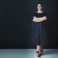 Portrait, woman and confident for fashion in studio, professional clothes and administration...