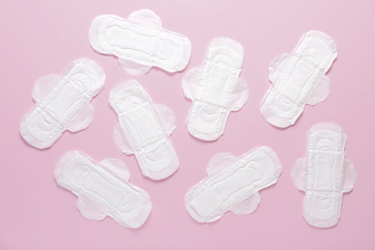 Menstrual pads on pink background