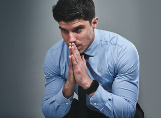 Thinking, stress and crisis with business man in studio for debt, bankruptcy and negotiation fail....