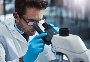 Science, man and microscope in lab for development, pharma experiment and research. Exam, scientist...