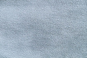Grey fleece fabric as texture, background © Mikhail Taratonov