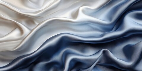 Obraz premium A close-up of two layers of smooth, flowing satin fabric in shades of blue and white, creating an elegant background texture