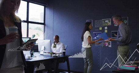 Image of financial data processing over diverse colleagues discussing work in office