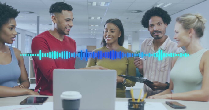 Image of data processing over diverse colleagues discussing work in office