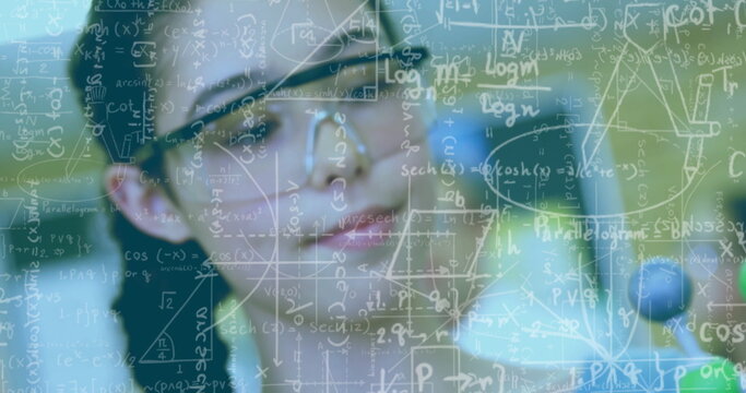 Mathematical equations and formulas image over person working in laboratory