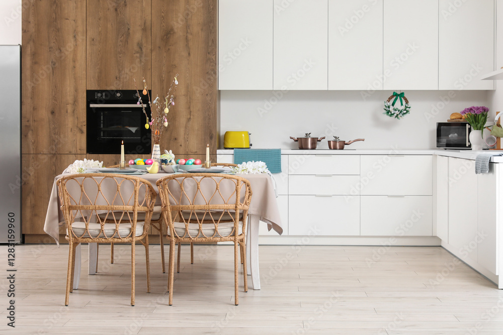 Wall mural Interior of modern kitchen with festive table serving for Easter celebration