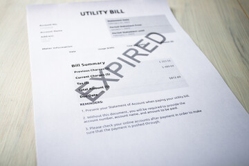 Obraz premium Expired Utility Bill Notice, late payment warning for gas and electricity charges, monthly service balance and tax details