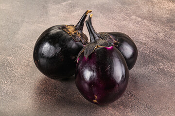 Raw violet and black eggplant
