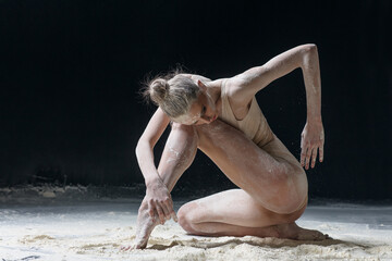 Dancing in flour dancer posing on a studio background
