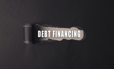 a torn piece of paper with the words debt financing