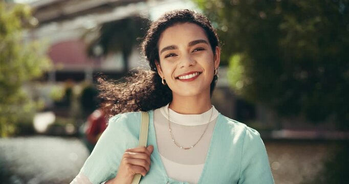 Face, happy woman or college student thinking of outdoor university campus for studying. Portrait, learning academy or confident gen z girl with smile for school, education or scholarship opportunity