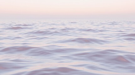 Fototapeta premium Gentle waves create a calming, pastel-colored ocean scene, perfect for backgrounds and serene visuals.