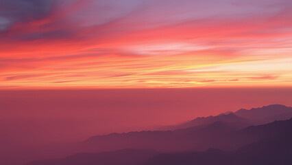 Dusk Delight: A Visually Striking Showcase of the Ethereal Beauty of a Sunset-Painted Sky Framing Distant Peaks